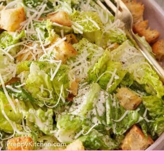 Pinterest graphic showing a close-up of homemade Caesar salad.