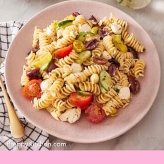 Pin image showing an overhead shot of a plate of pasta salad.
