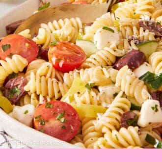 Pin image showing a close-up of pasta salad.