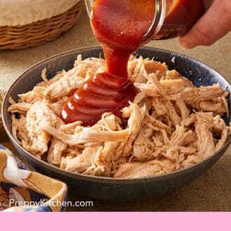 Pinterest graphic showing homemade BBQ sauce recipe poured over pulled meat.