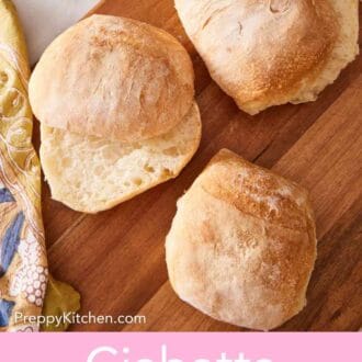 Pinterest graphic showing an overhead shot of homemade ciabatta rolls.