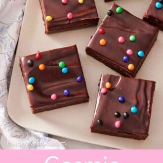 Pinterest graphic showing an overhead view of a platter of cosmic brownies.