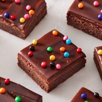 Close-up of cosmic brownies on a marble countertop.