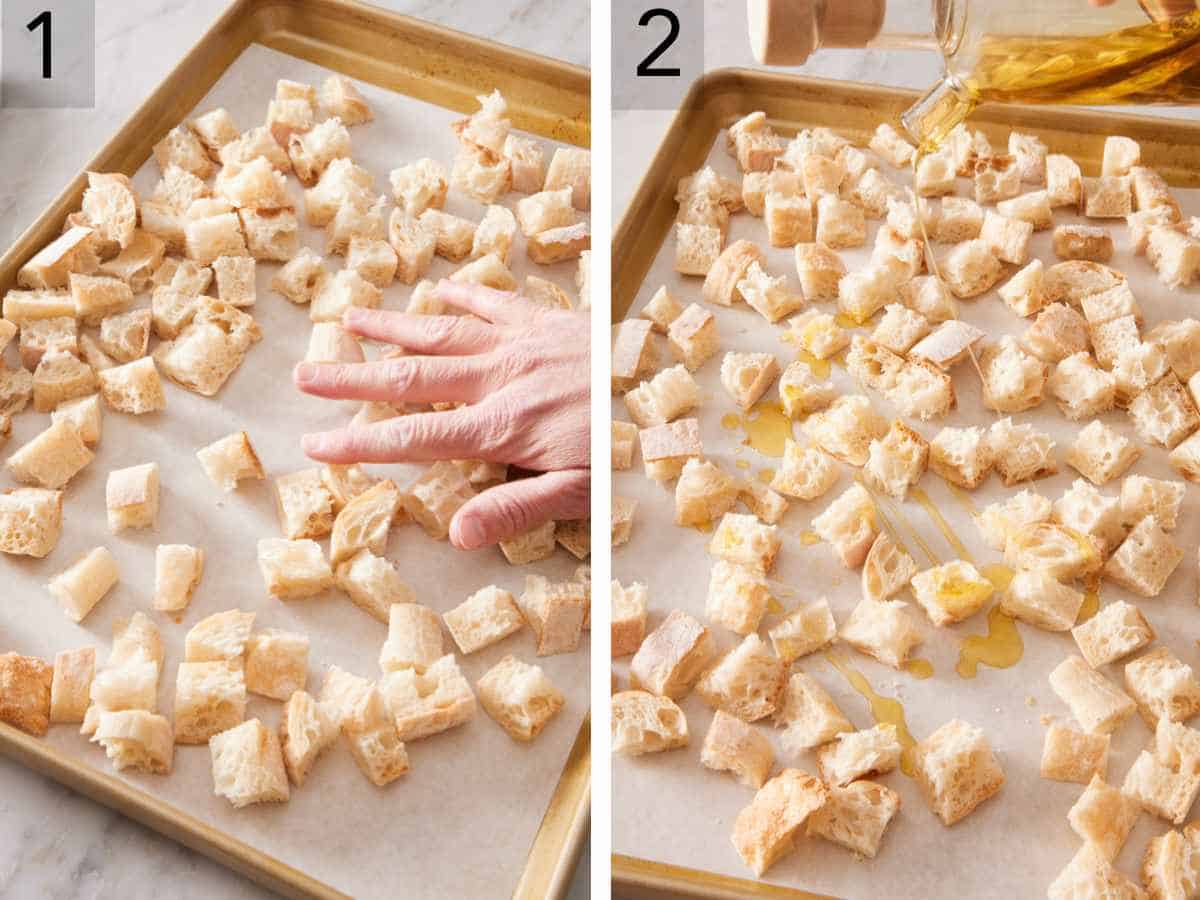 Set of two images showing cubed bread spread into an even layer on a baking sheet and drizzled with oil.
