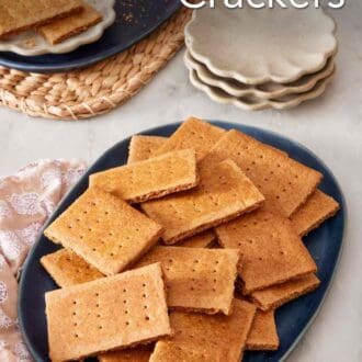 Pinterest graphic showing a blue platter piled with graham crackers.