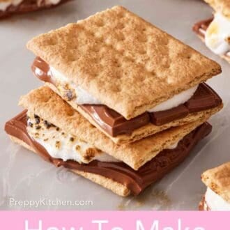 Pinterest graphic showing a stack of two s'mores recipe with more s'mores in the background.