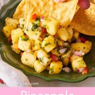Pinterest graphic showing pineapple salsa scooped with a tortilla chip.