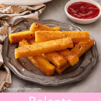Pinterest graphic showing a small plate of polenta fries next to a small dish of ketchup.