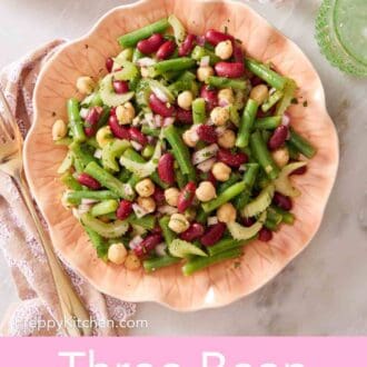 Pinterest graphic showing an overhead shot of a serving of classic three bean salad recipe.