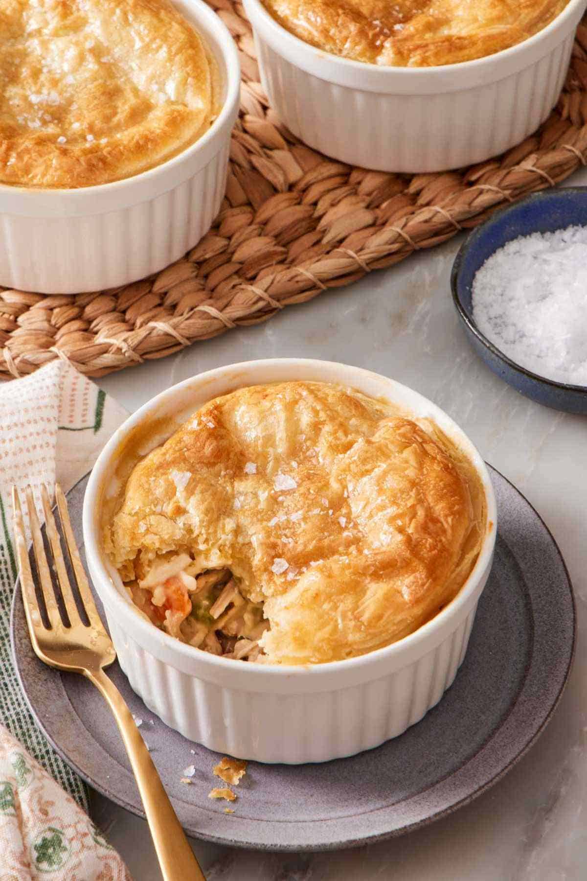Mini chicken pot pie in a ramekin.