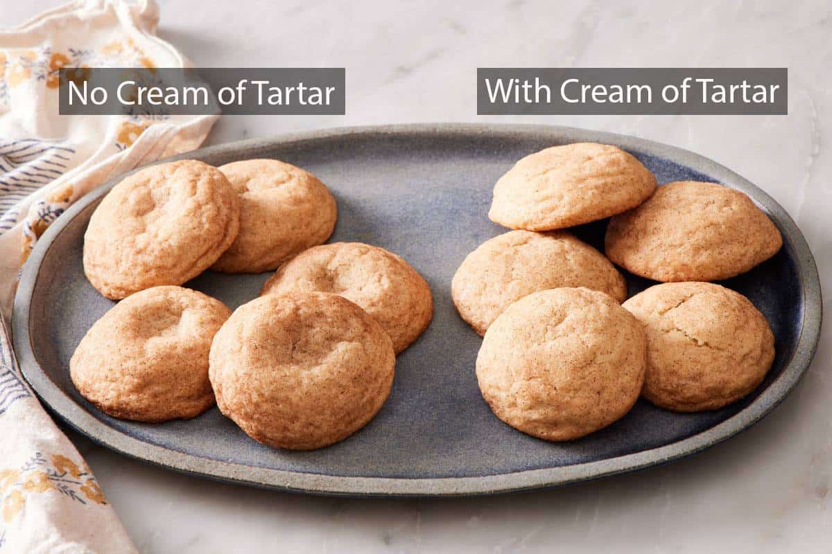 Two piles of snickerdoodle cookies on a platter: one made with cream of tartar, and one made without.