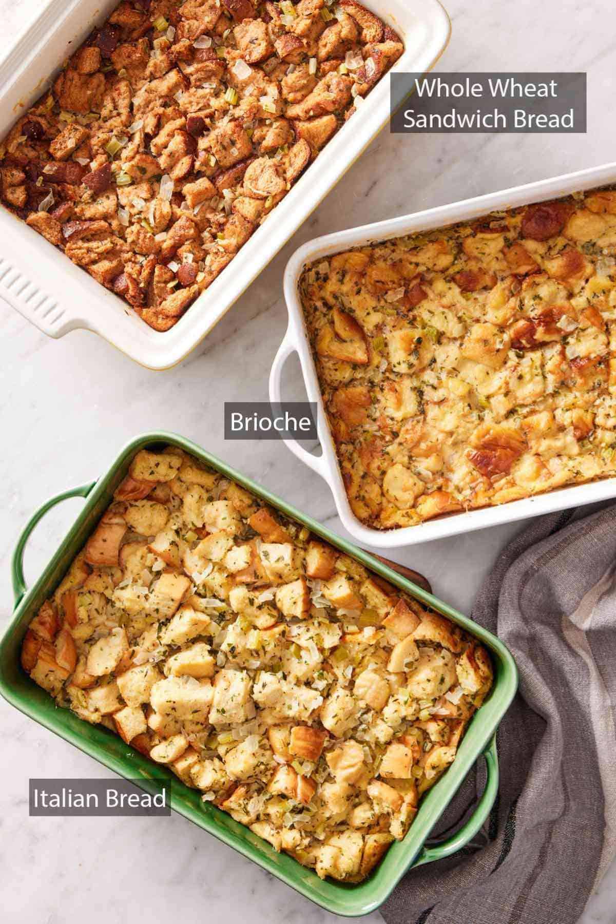 Overhead shot of 3 casserole dishes of stuffing: one made with whole wheat sandwich bread, one made with brioche, and one made with Italian bread.