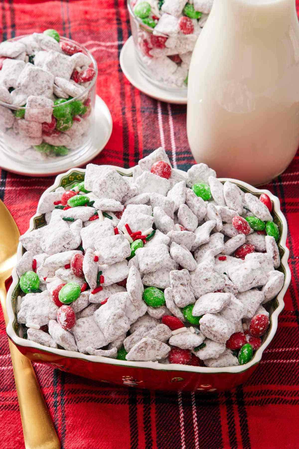 A bowl of puppy chow with seasonal M&Ms tossed in.