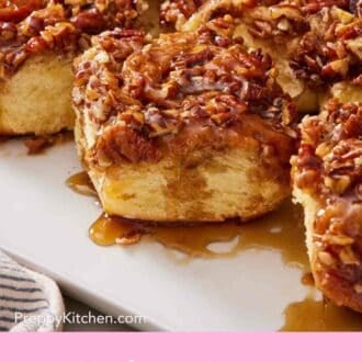 Close up of sticky buns on a white platter.