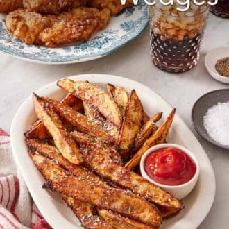 Pinterest graphic of baked potato wedges on a platter with fried chicken in the background.