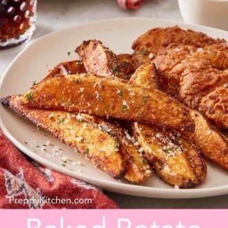 Pinterest graphic of a close-up of baked potato wedges on a plate with fried chicken.