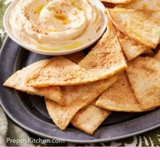 Pinterest graphic showing a platter of pita chip recipe with hummus.