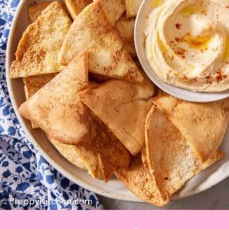 Pinterest graphic showing an overhead shot of pita chips recipe on a plate with a small bowl of hummus.