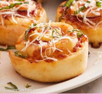 Pinterest graphic showing a close-up of a few pizza rolls on a white platter.