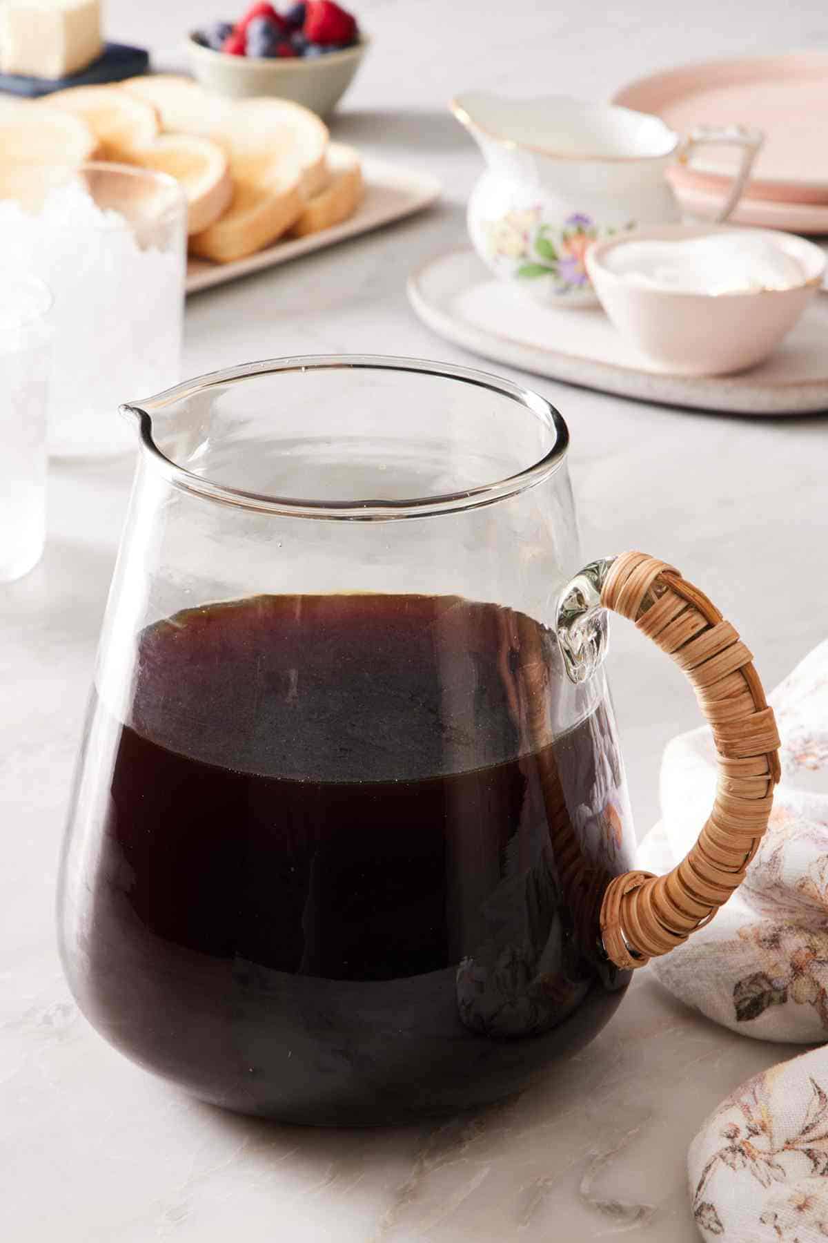 A glass pitcher of homemade cold brew coffee.