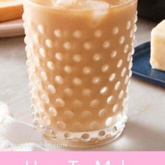 A glass of milky cold brew coffee.